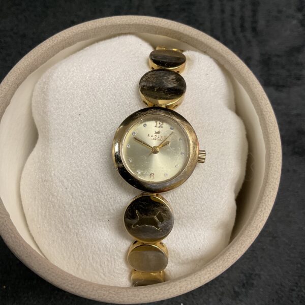 Gold-tone Radley ladies wristwatch with a classic dial.