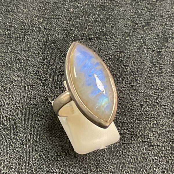 Sterling silver ring with a luminous rainbow moonstone.