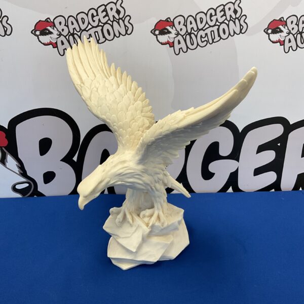 Detailed resin eagle sculpture for home decor and collectors.