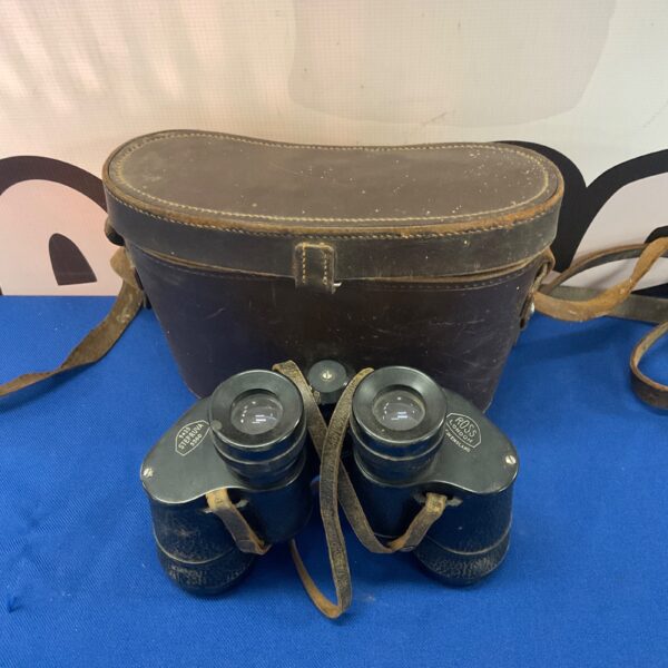 Vintage Ross London Stepruva 9x35 binoculars in a protective case.