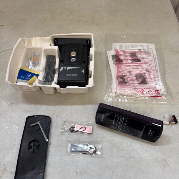 Samsung SHP-DP728 digital door lock with instructions.