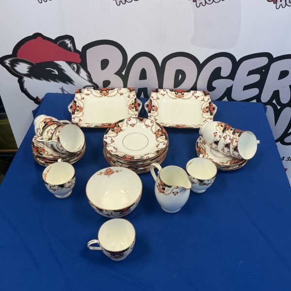 Antique Samuel Redford China tea set with floral pattern.