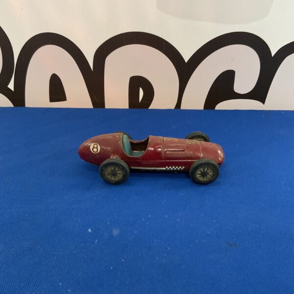 Vintage red Scalex Ferrari 4S friction car, collectible toy.