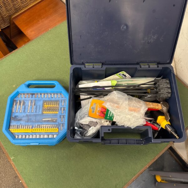 Blue plastic case containing assorted screwdriver bits for DIY projects.