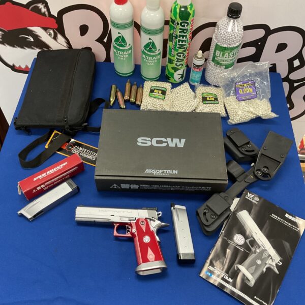 SCW Infinity gas pistol with gas canisters and BBs.