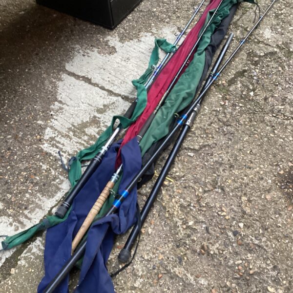 Mixed lot of sea and boat fishing rods for angling.