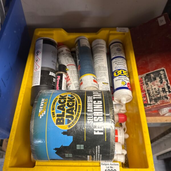 Selection of sealant and adhesive tubes with flashing tape.