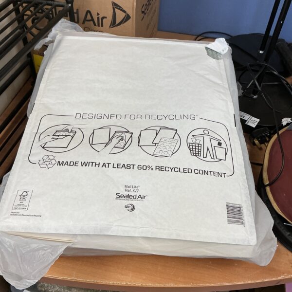 Quantity of Sealed Air padded mailing envelopes for secure shipping.