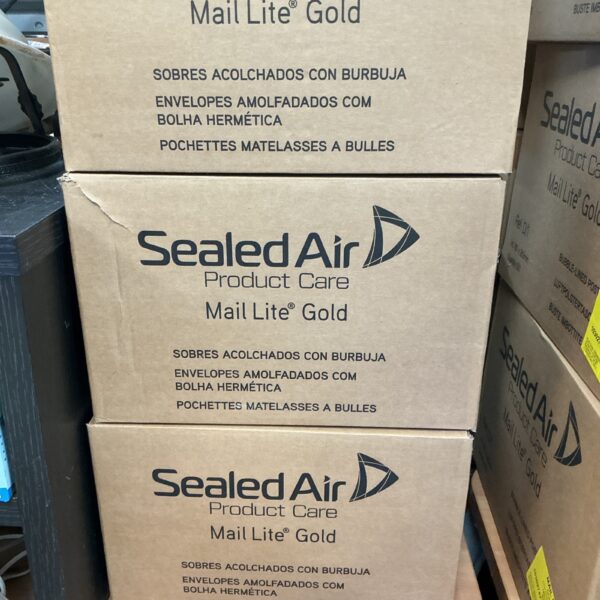 Three boxes of Sealed Air padded envelopes for secure shipping.