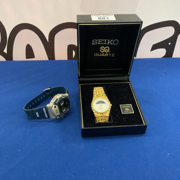 Gold Seiko style sports watch with analogue display.