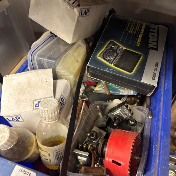 Assorted shed clearance lot with toggle switches and electrical components.