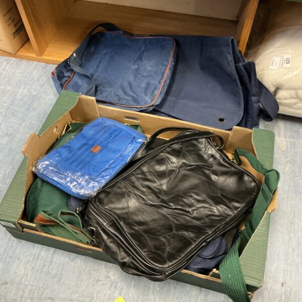 Mixed lot of shoulder bags in varying styles and materials.