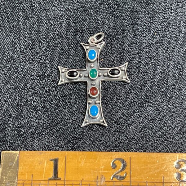 Vintage silver cross pendant with colourful stone inlays.