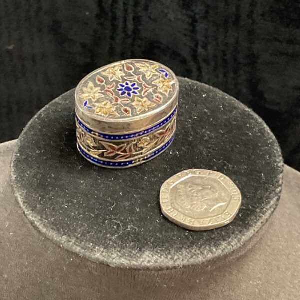 Vintage silver pill pot with colourful enamel floral design.