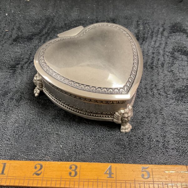 Antique silver plate heart shaped trinket pot with lion feet.