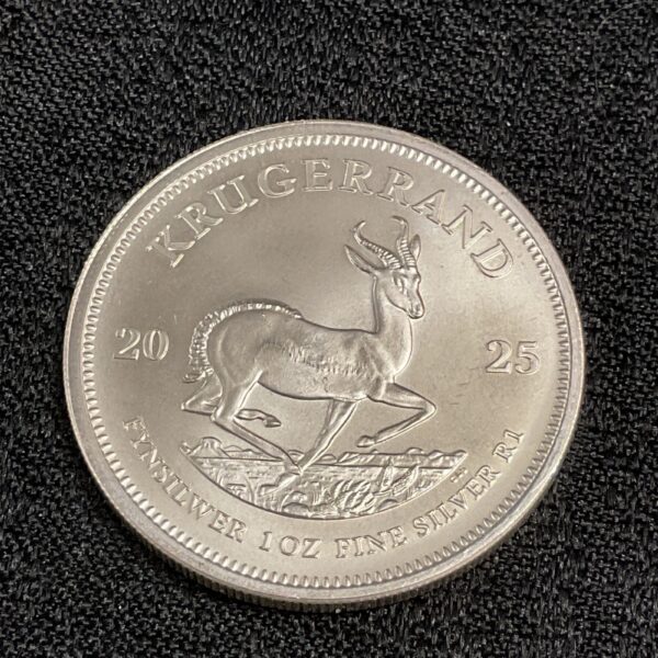 Silver Krugerrand coin obverse featuring Paul Kruger portrait.