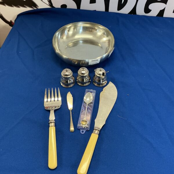 Vintage silverplate cutlery set with salt and pepper pots.