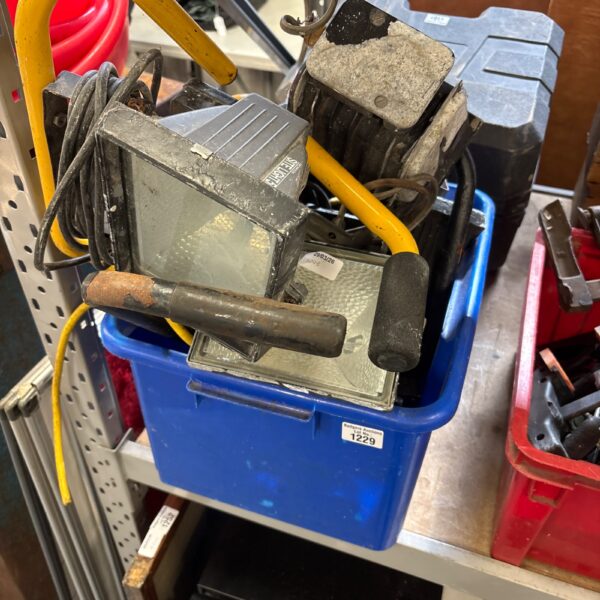 Mixed lot of a durable site light for construction or industrial use.