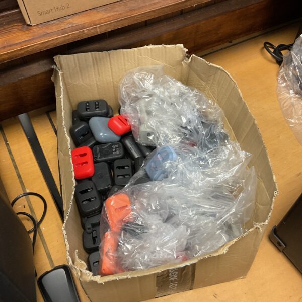 Lot of Skullcandy earpod charging cases for wireless earbuds.