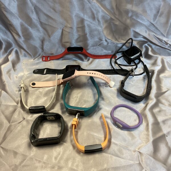 Collection of colourful smart watches and fitness trackers.