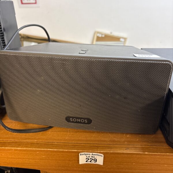 Black Sonos Play 3 wireless smart speaker for home audio.