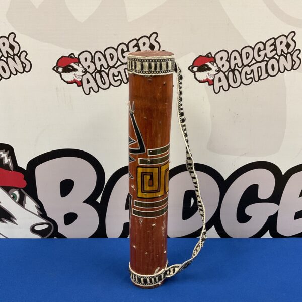 Traditional South American rain maker instrument with woven texture.