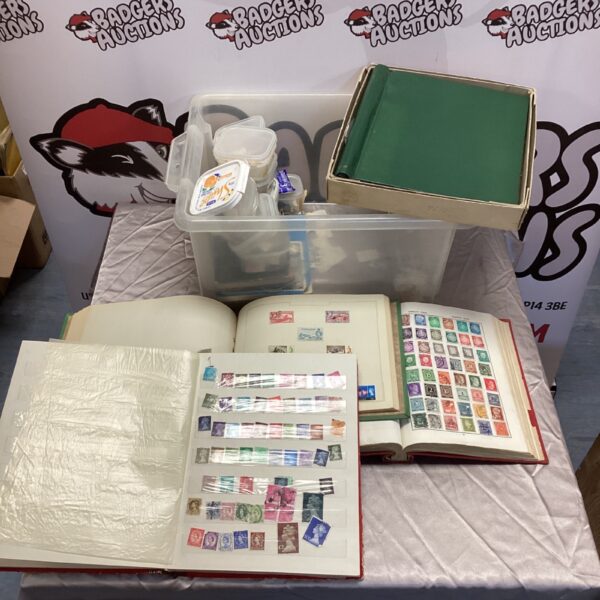 Vintage stamp collection in albums and loose stamps for collectors.