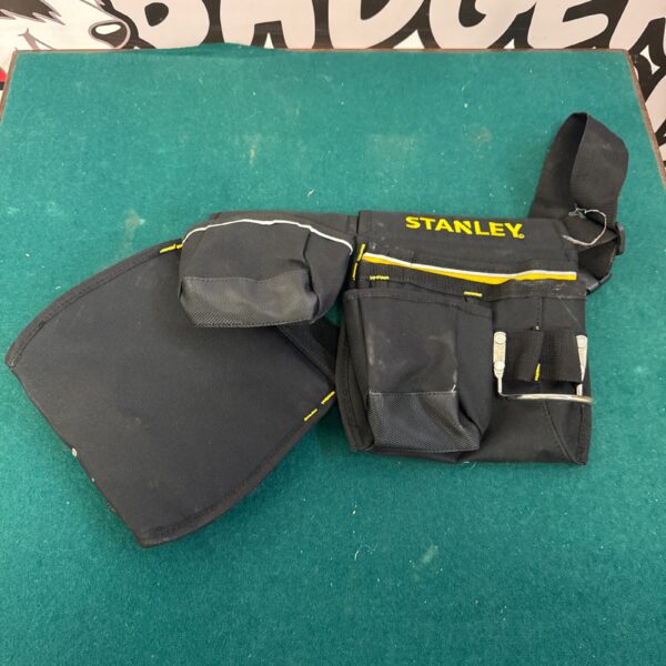 Black Stanley tool belt with multiple pockets for tool storage.