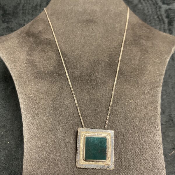 Vintage sterling silver square pendant necklace with green stone.