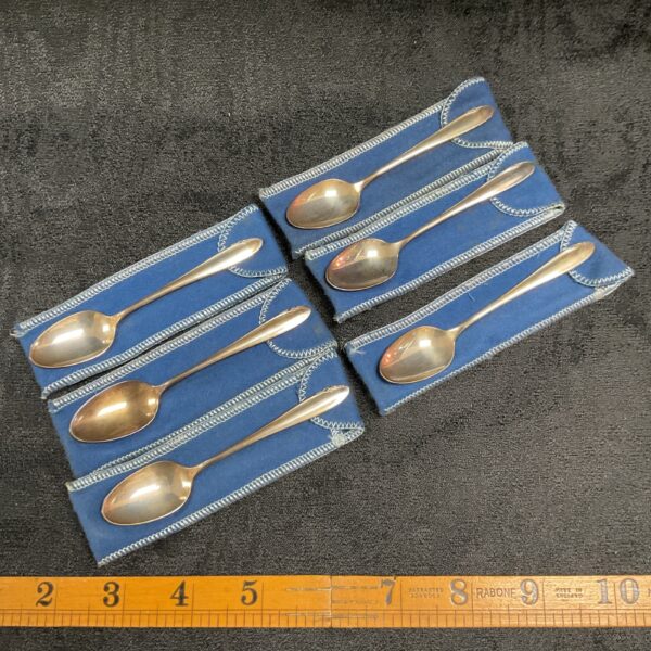 Set of six sterling silver teaspoons in protective anti-tarnish bags.