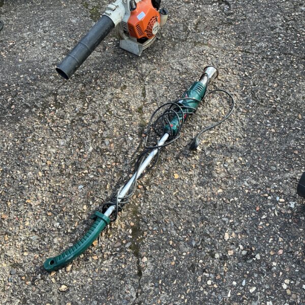 Used Stihl electric weed burning lance for garden weed control.