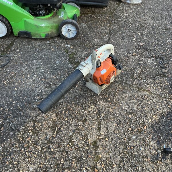 Used Stihl petrol leaf blower for garden maintenance.