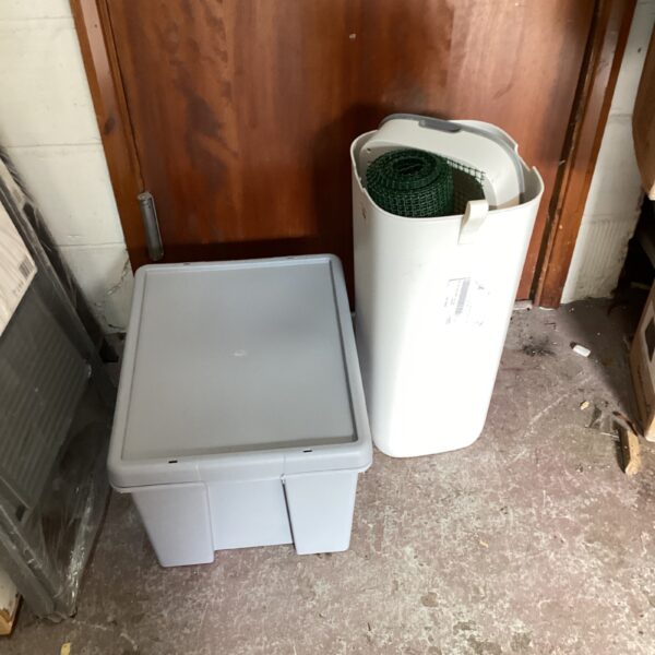 Grey storage box with garden bin and netting included in bundle.