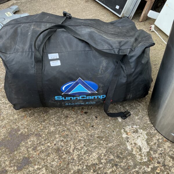 Vintage Sunncamp Shadow 800 tent rolled up and stored.