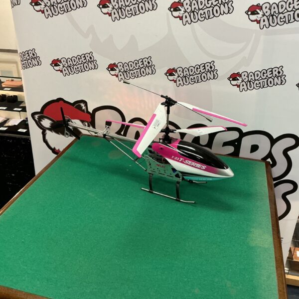 Vibrant T Series RC helicopter presented for auction.