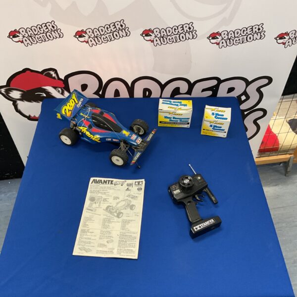 Vintage Tamiya Avante 2001 RC car with remote control.