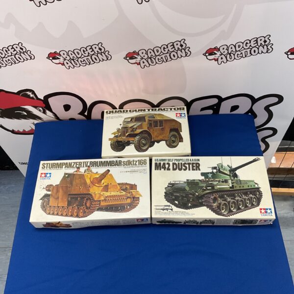 Tamiya scale model kits lot featuring military vehicles, including the Sturmpanzer IV.