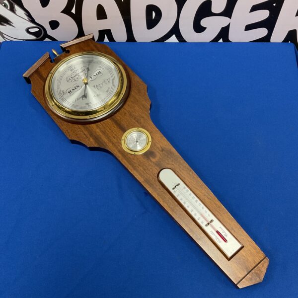 Antique Taylor England brass aneroid barometer for wall mounting.