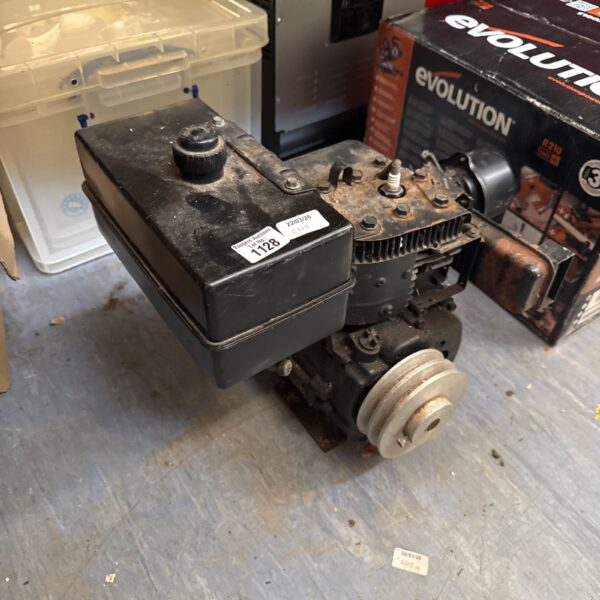 Used Tecumseh engine with pulley system for garden tools.