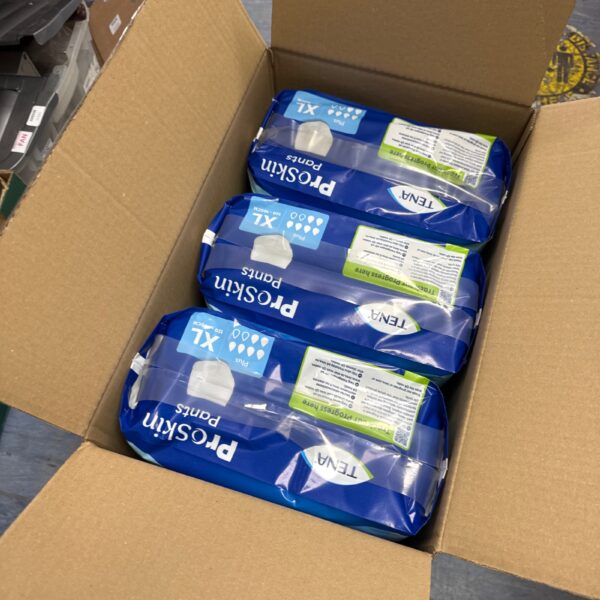 Sealed packs of Tena Proskin Pants XL incontinence underwear.
