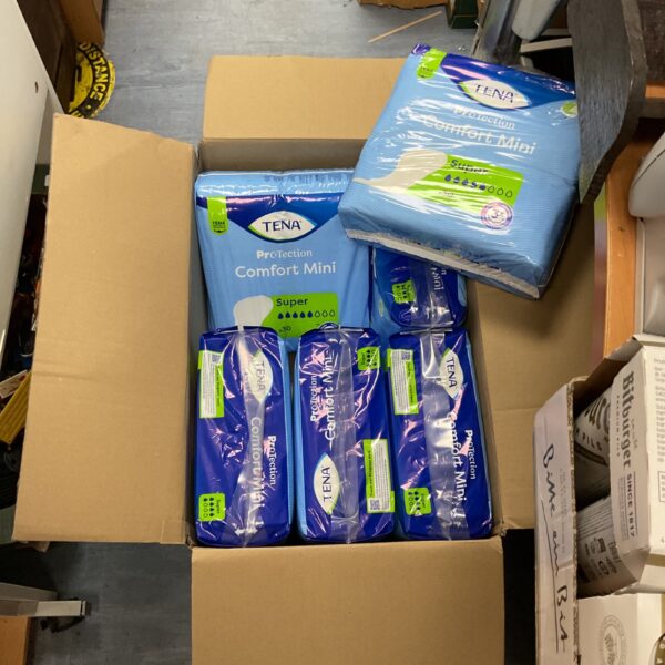 Lot of six unopened Tena Protection Comfort Mini incontinence pads.