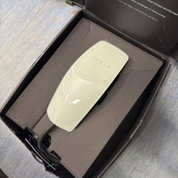 Tesla Wall Connector charger for home EV charging.
