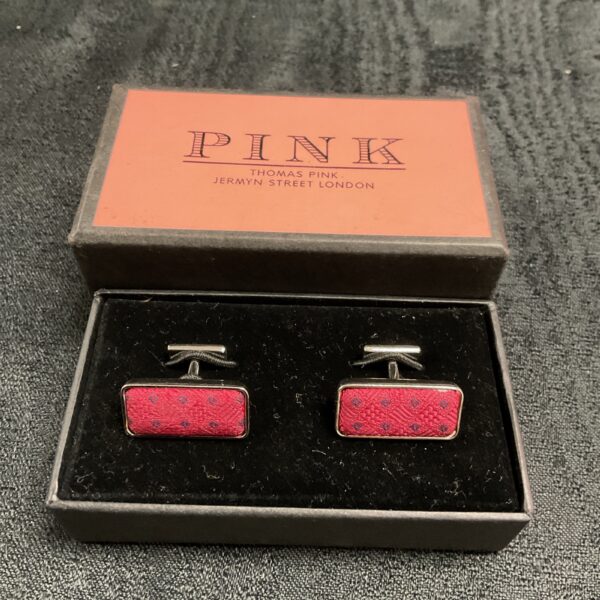 Stylish Thomas Pink cufflinks with a silk knot design.