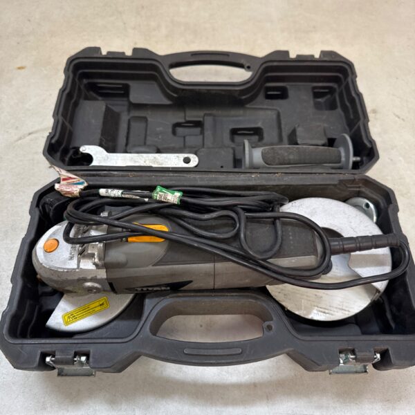 Titan angle grinder in its original carrying case, workshop tool.