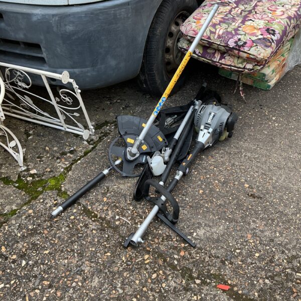 Used Titan garden multi tool with hedge trimmer attachment.