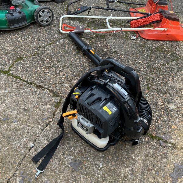 Used Titan petrol leaf blower for garden maintenance.