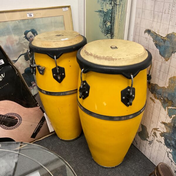Pair of vibrant Toca bongos, latin percussion instruments.