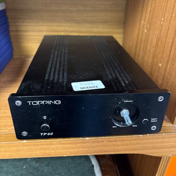 Topping TP60 mini amplifier for desktop audio setups.