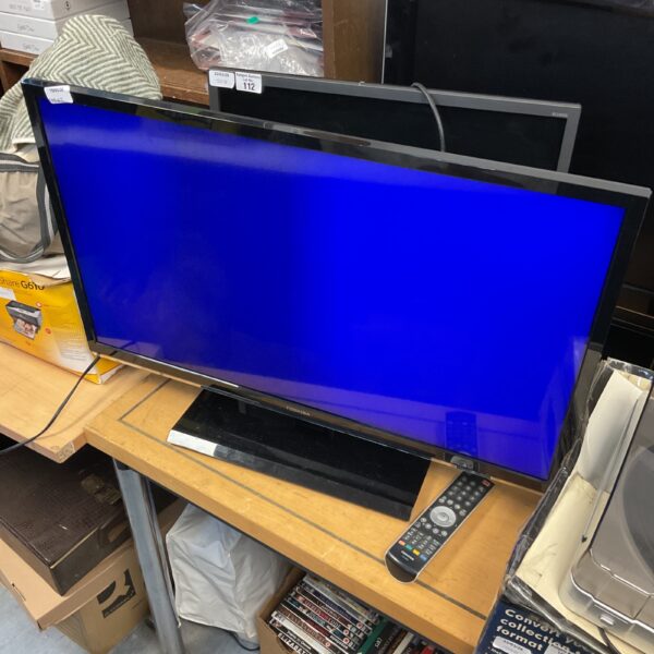 Toshiba 32 inch HD television with remote control.