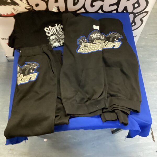 Front view of Trapstar London Shooters hoodie and tracksuit bottoms bundle.